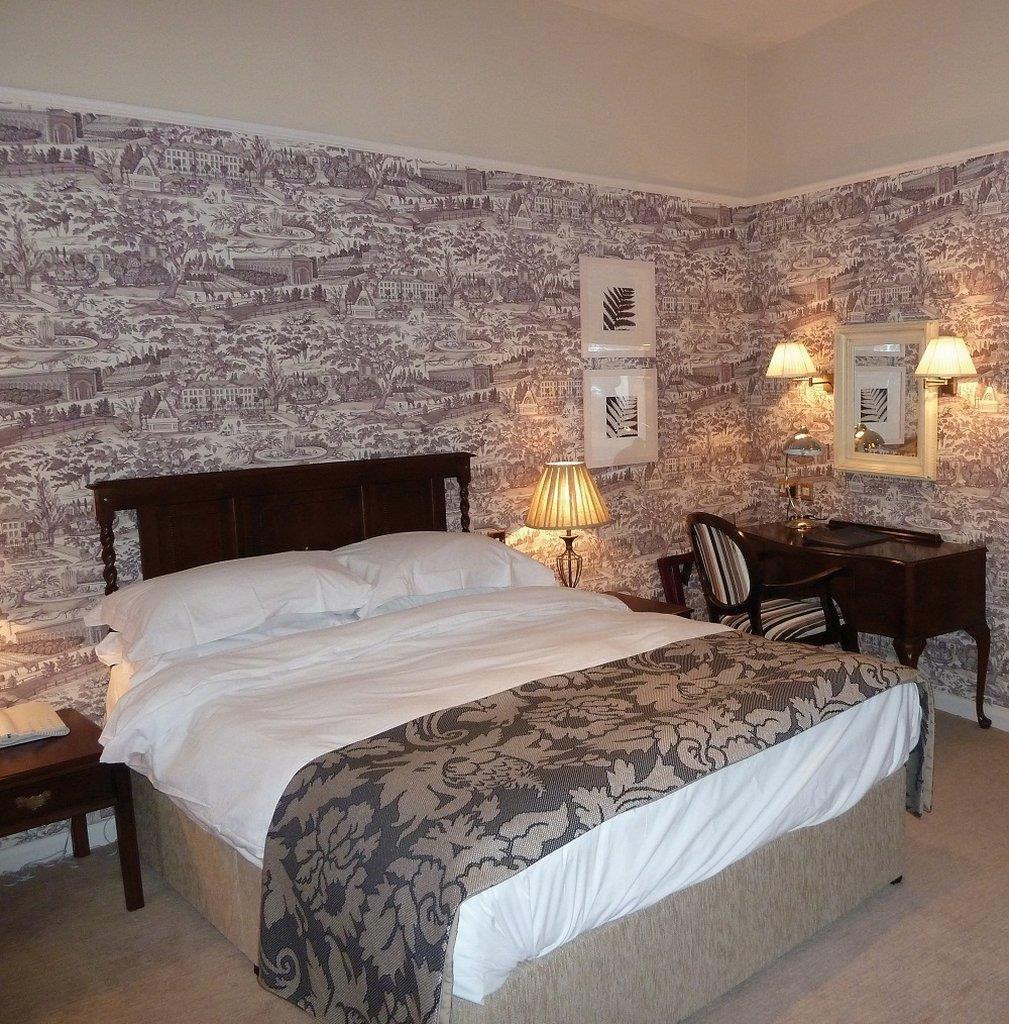 The Fleece At Cirencester Cameră foto A bedroom at the hotel